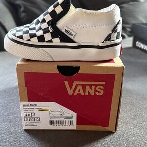 Vans Black and White Checkered Slip-Ons